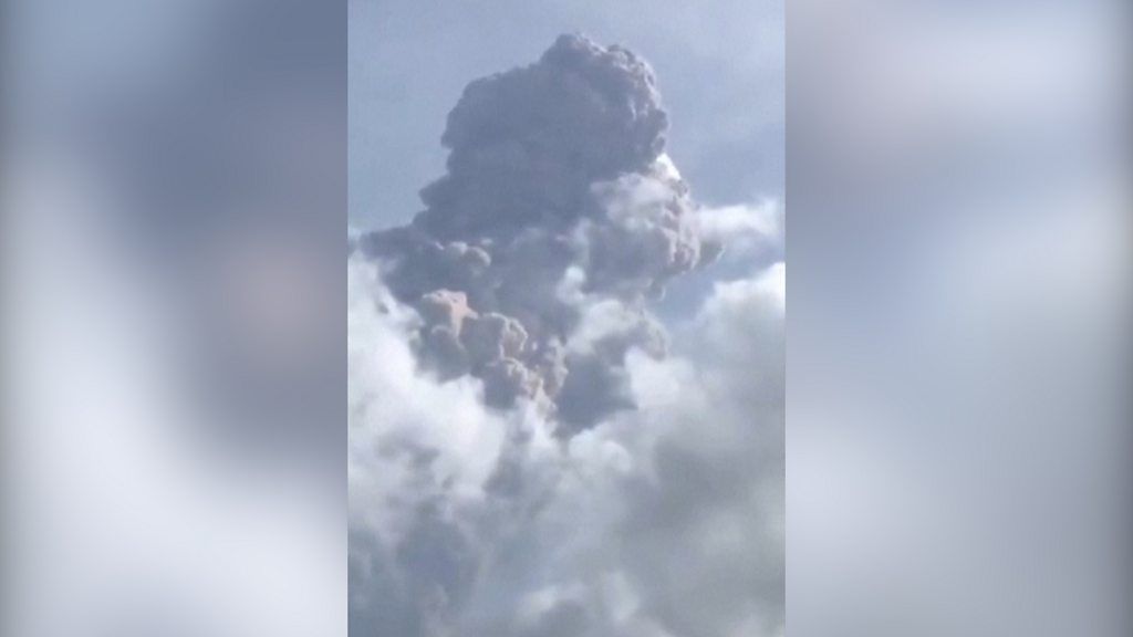 La Soufrière on St Vincent island spews ash 6km into the air as thousands are evacuated.