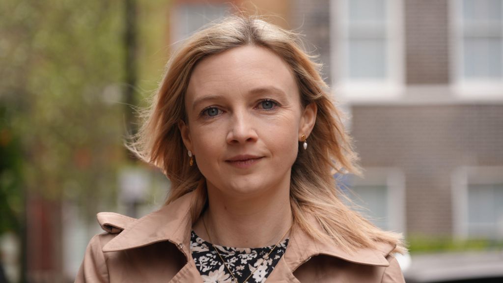 Sarah North is outside in a quiet London street looking directly at the camera