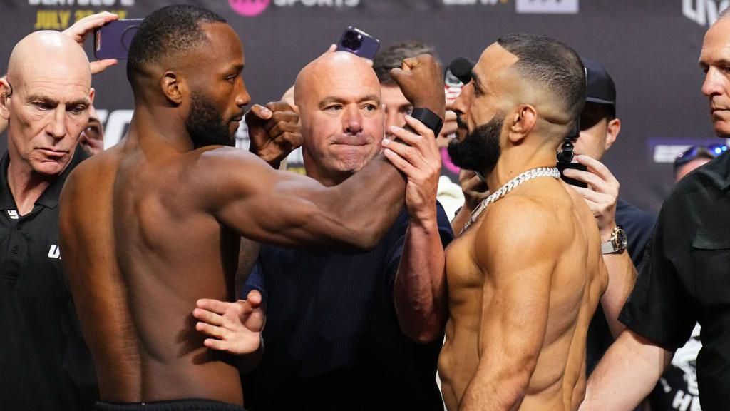 Dana White stands in between Leon Edwards and Belal Muhammad