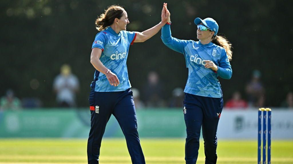 Kate Cross (left) and Tammy Beaumont observe a wicket against Ireland