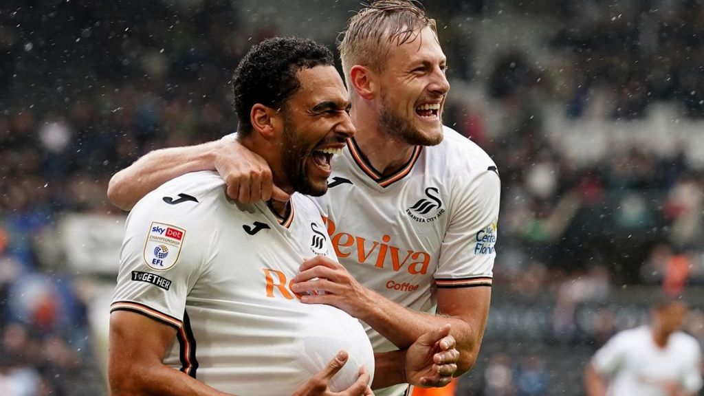 Swansea City defender Ben Cabango celebrates his opening goal against Bristol City