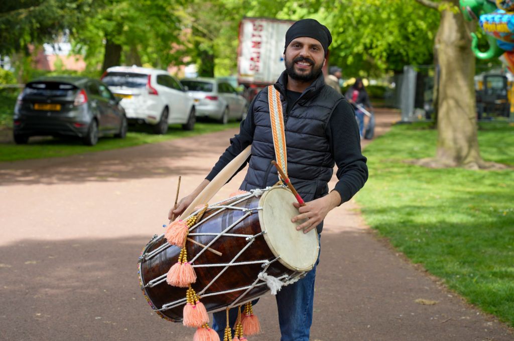 A man holding a drum