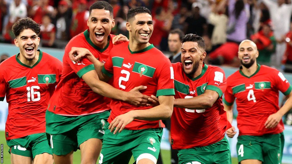 Morocco players celebrate winning a match at the 2022 Fifa World Cup