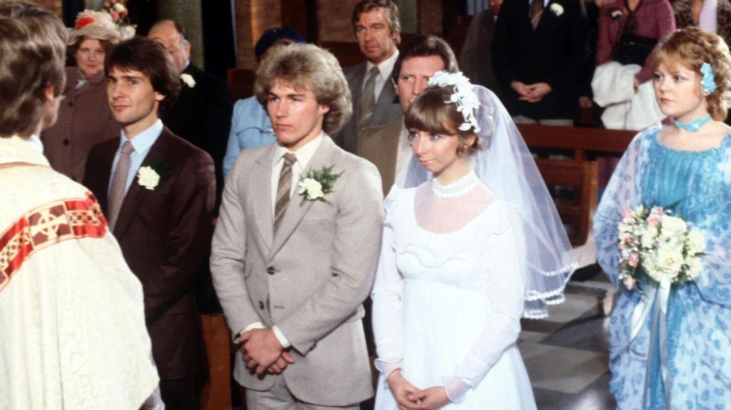 Gail and Brian in church getting married