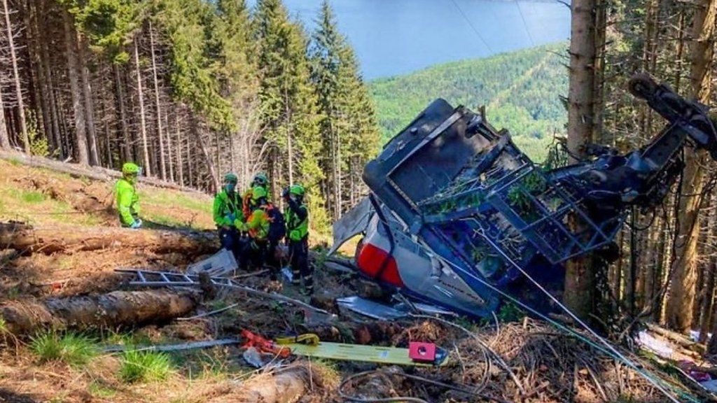First pictures have emerged after the cable car fell on a mountain in northern Italy.