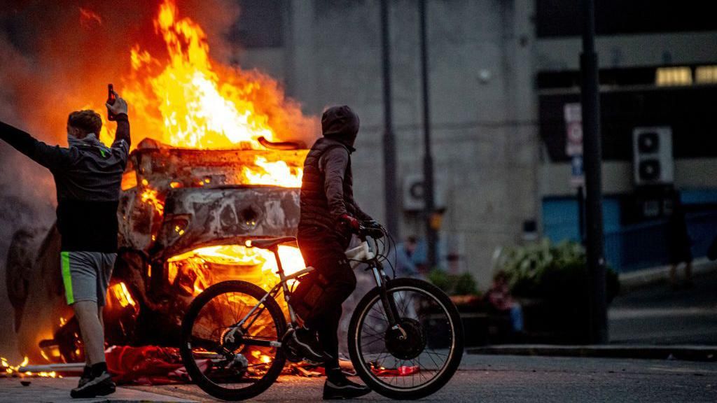 Eight arrested and building burned during Sunderland unrest - BBC News
