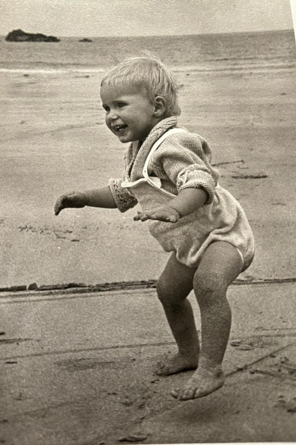 Katie as a baby on the beach in Alderney