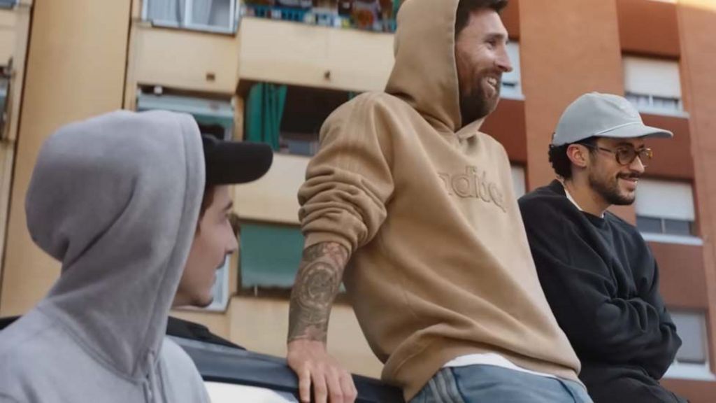 Timothée Chalamet with Lionel Messi, both smiling and wearing hoodies