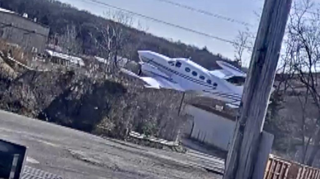 Surveillance footage shows the moment a plane fell out of the sky in Oyster Bay, New York.