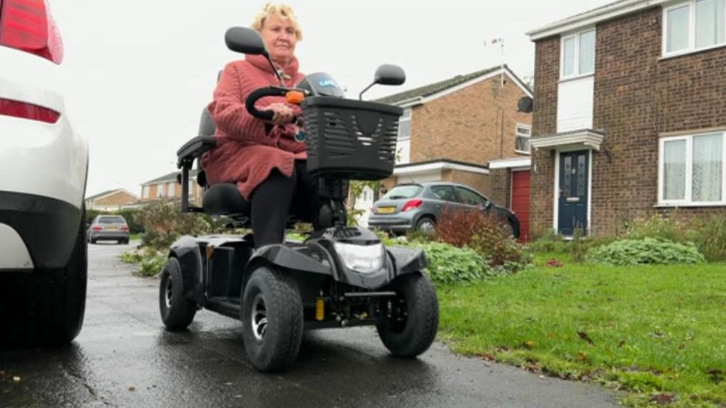 O﻿lga Tatarenko on her mobility scooter