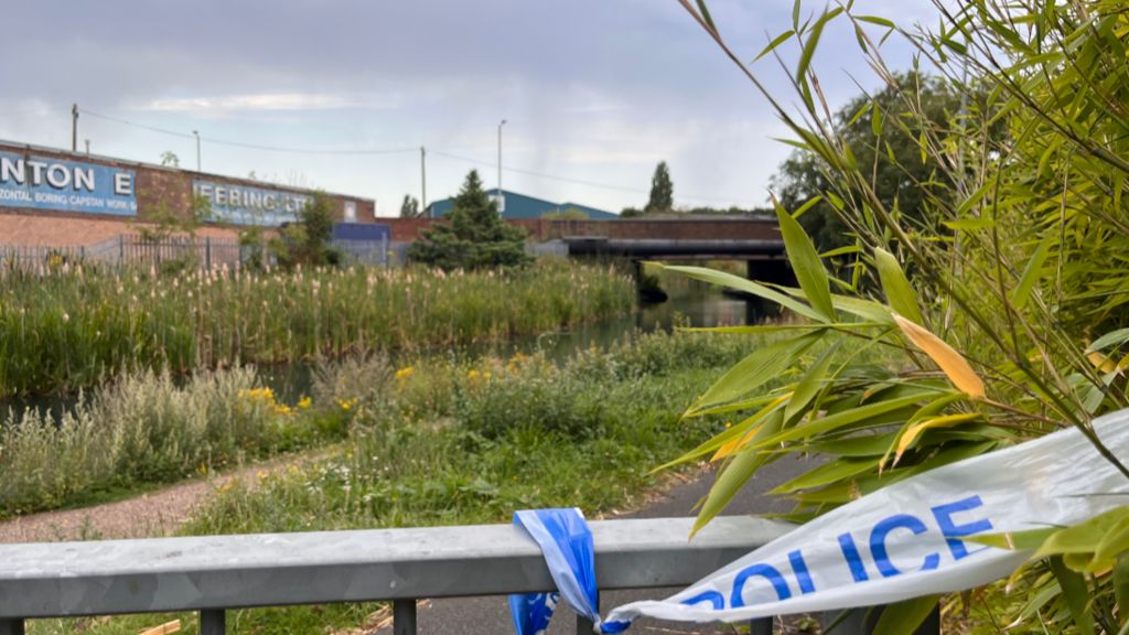 The canal with police tape in the foreground