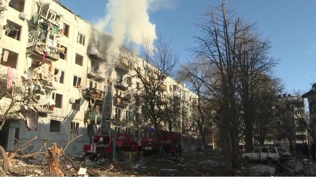 Smoke emerges from residential building after bombing
