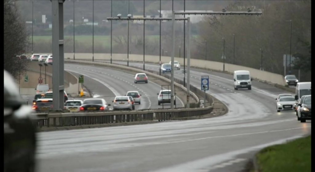 Cars driving along A20