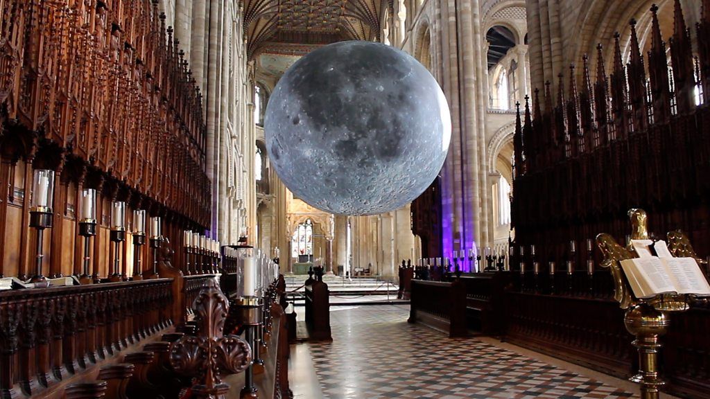 Moon hanging in cathedral