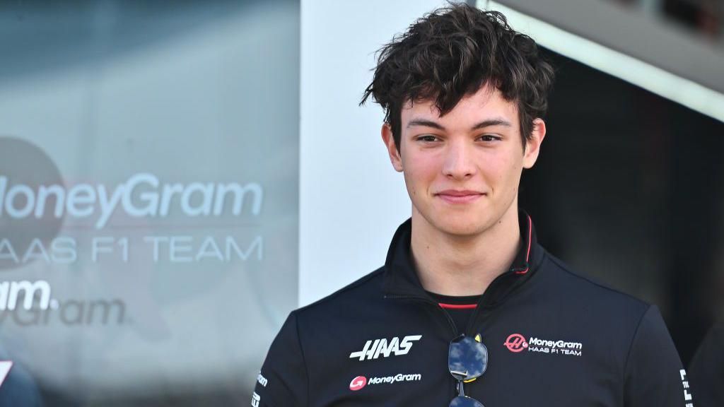 Oliver Bearman wears his Haas kit in the paddock at Silverstone 