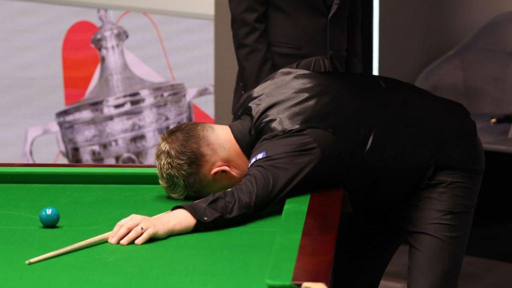 Kyren Wilson reacts after missing a 147 chance
