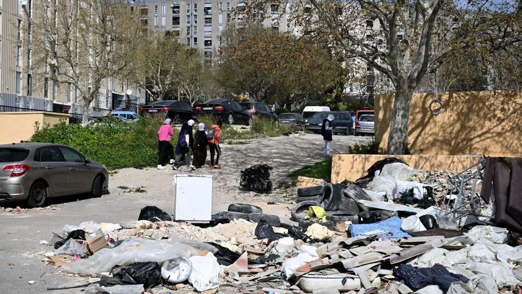 A view of a suburb in Marseille, with rubbish on the ground