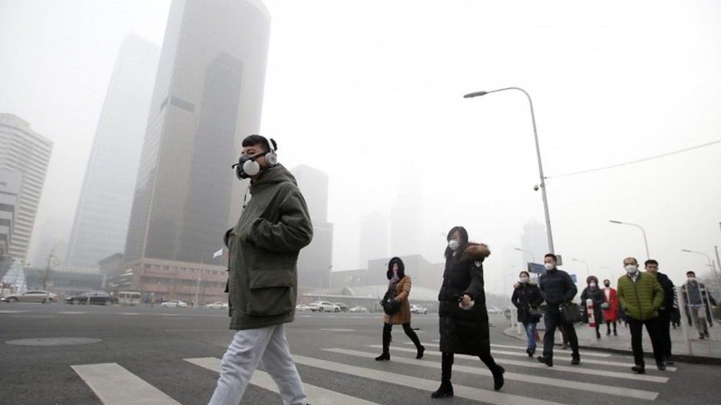People wearing air pollution mask