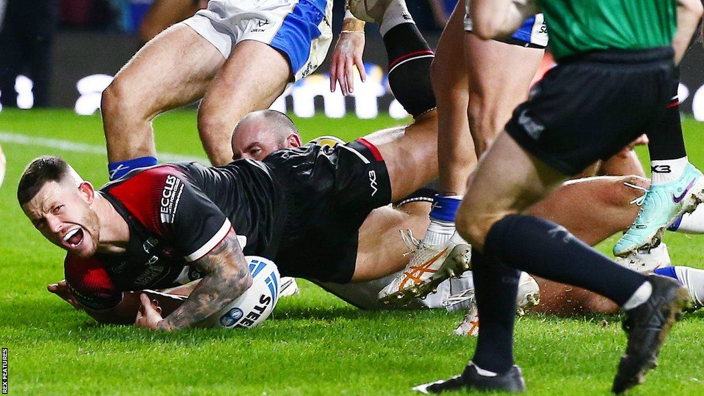 Cade Cust scores Salford's opening try against Leeds Rhinos