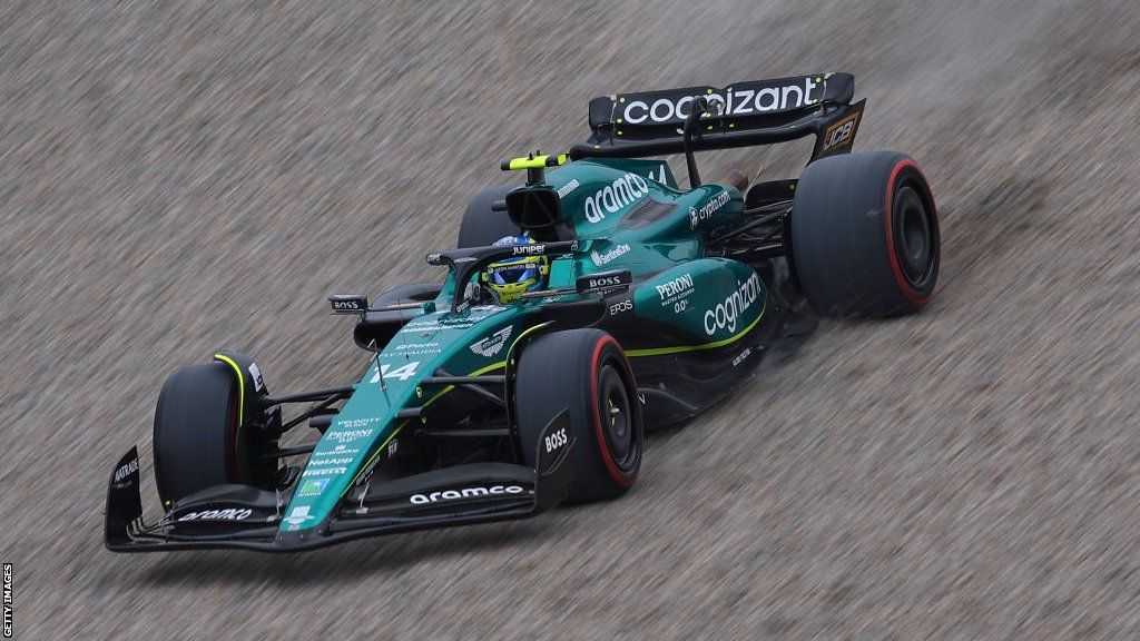 Fernando Alonso's car takes a trip through the gravel in Barcelona