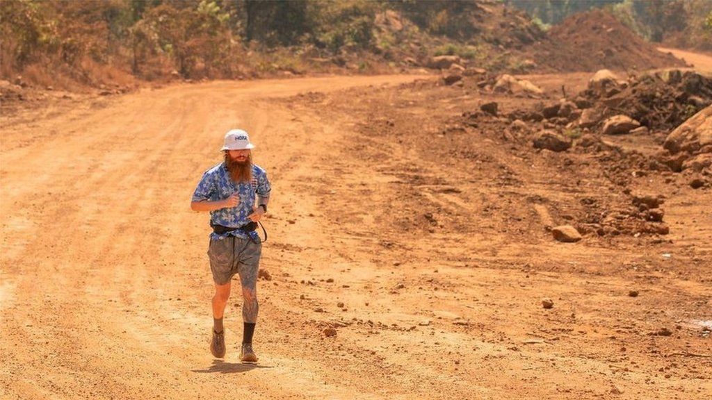 Russell Cook running in Guinea