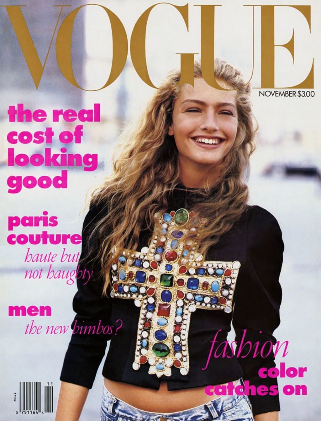 Anna Wintour's first Vogue cover in November 1988, showing Michaela Bercu, smiling at the camera in a Christian Lacroix couture jacket and pair of jeans