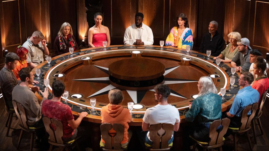 The Traitors contestants around the round table