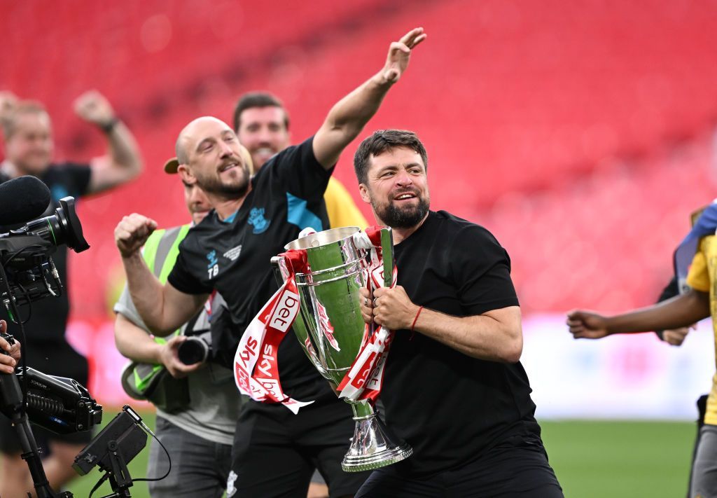 Southampton boss Russell Martin lifts the Championship play-off final trophy