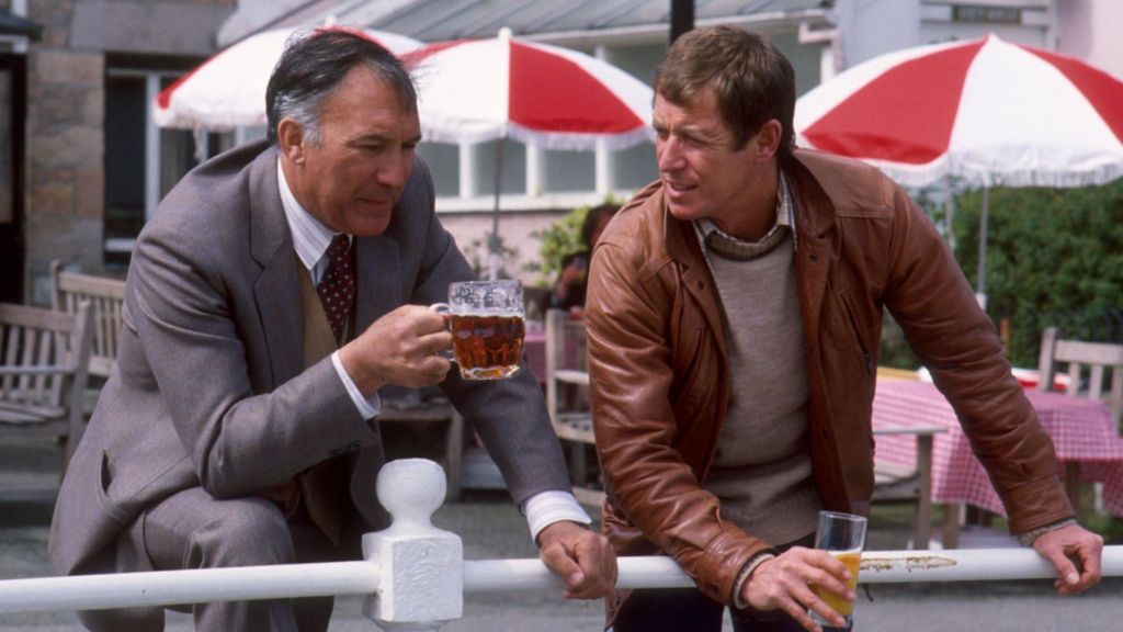 Lee Montague as Inspector Henri Dupont and John Nettles as Det. Sgt. Jim Bergerac in series three of the drama 'Bergerac' which sees John Nettles play a Detective Sergeant in the Jersey States Police