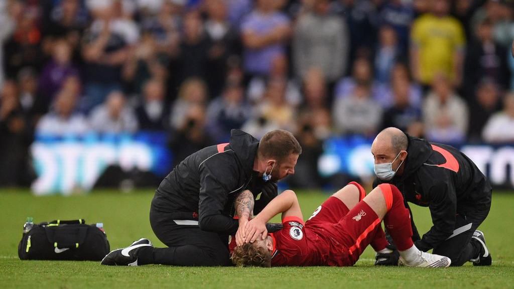 Harvey Elliott receives treatment after serious ankle injury