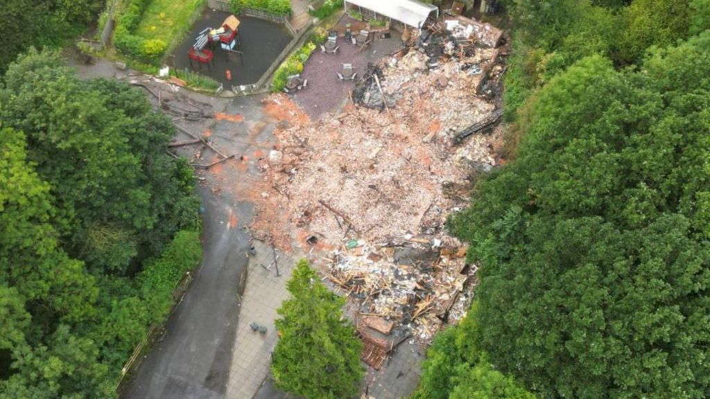 Aerial view of the rubble left behind after the demolition of the Crooked House