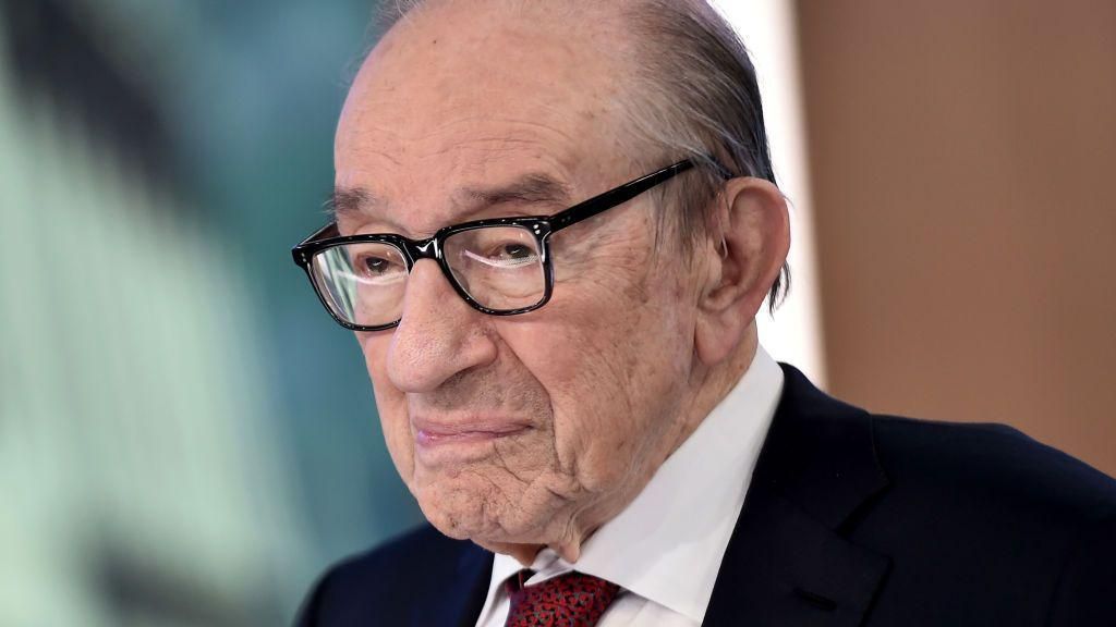 Alan Greenspan is photographed in later life. He is looking off to the side and not smiling.