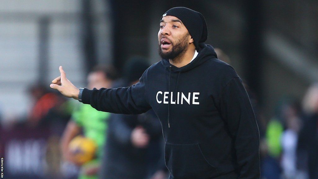 Troy Deeney on the touchline during a Forest Green match