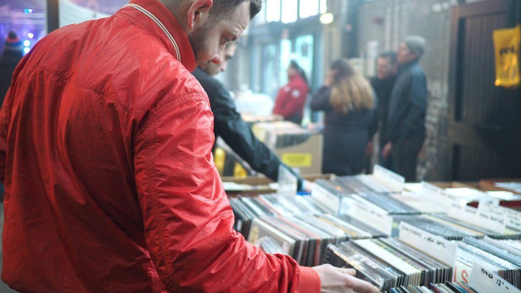 A man browses records in The Boiler Shop record store in Newcastle
