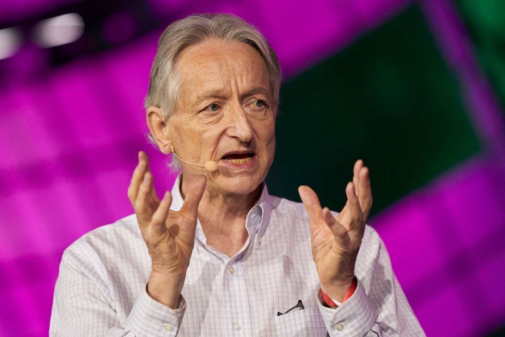 British-Canadian cognitive psychologist and computer scientist Geoffrey Hinton, known as the 'godfather of AI' speaks with Nick Thompson of The Atlantic (off frame) during the Collision Tech Conference at the Enercare Centre in Toronto, Ontario, Canada, on June 28, 2023. 