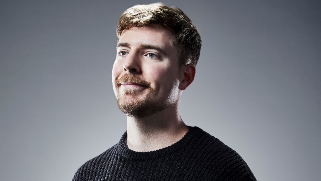 MrBeast, a young man with short brown hair and facial hair.