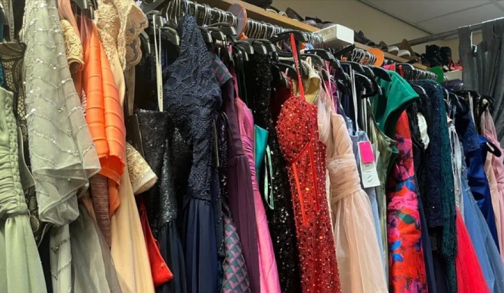Dresses lined up at the prom shop
