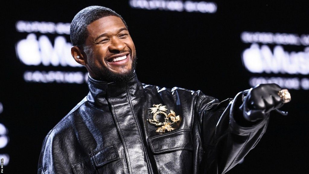 Usher at his news conference before Super Bowl 58
