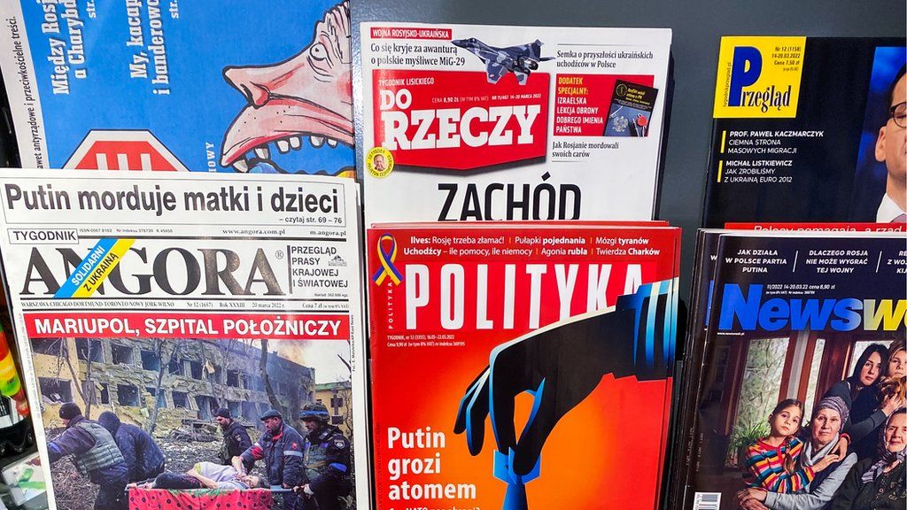 A shelf of Polish magazines and newspapers is seen at a kiosk.