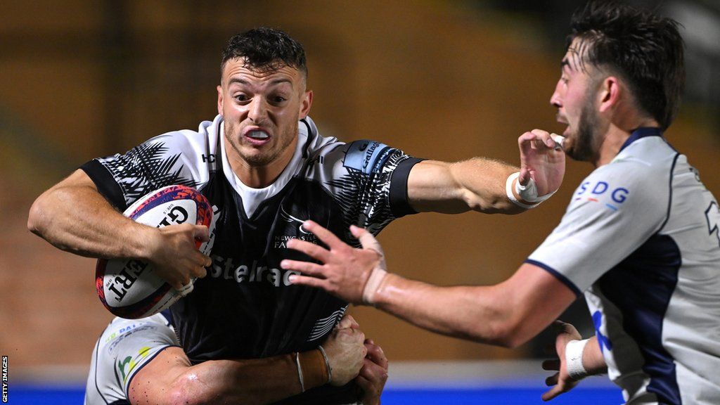 Newcastle Falcons wing Adam Radwan takes on the Bedford Blues defence during a Premiership Rugby Cup match