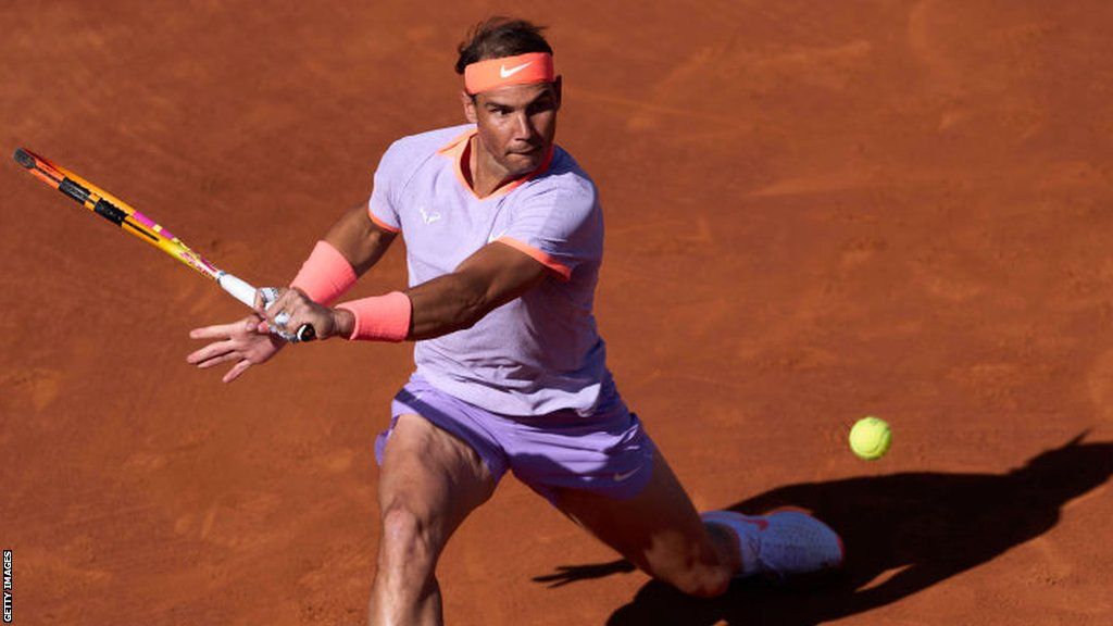 Rafael Nadal hits a forehand return at the 2024 Barcelona Open