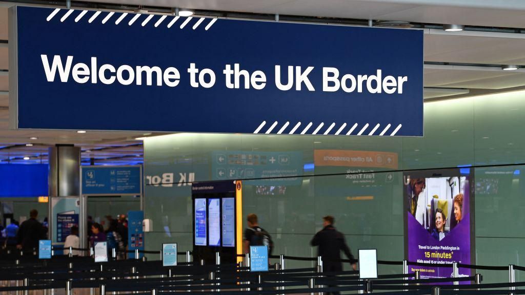 UK border signage at passport control in Heathrow Terminal 2 