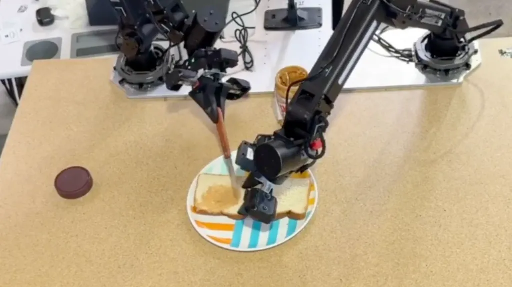Robot hands making a peanut butter sandwich