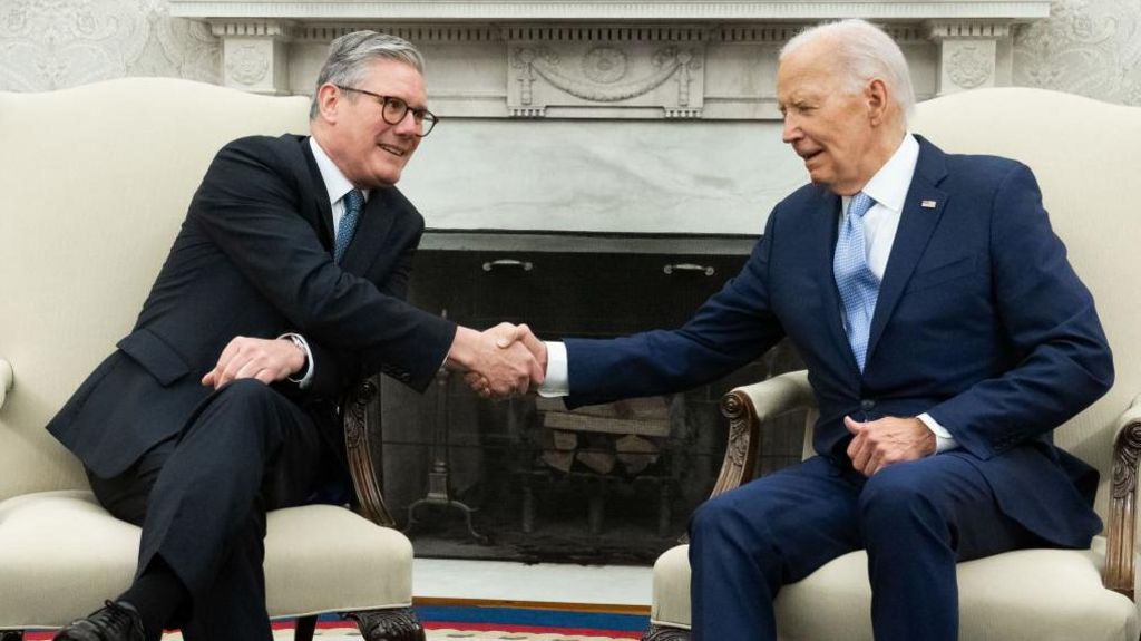 Sir Keir Starmer shares a handshake with Joe Biden at the Oval Office in the White House on 10 July 2024