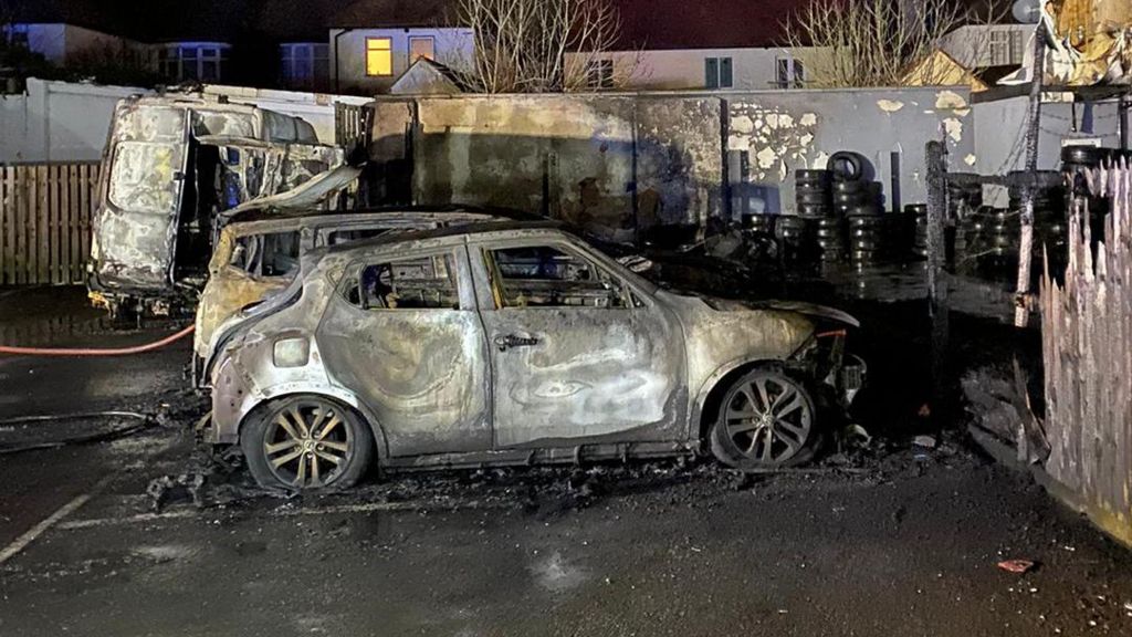 Some of the vehicles burnt out after the fire at a yard in Southend, Essex