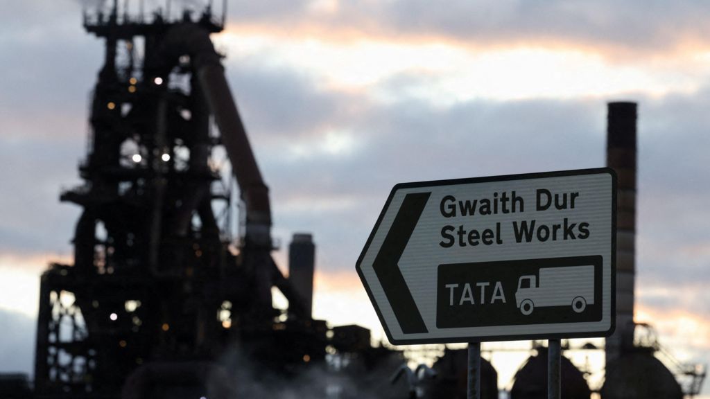 Steel works sign and old furnace in the background