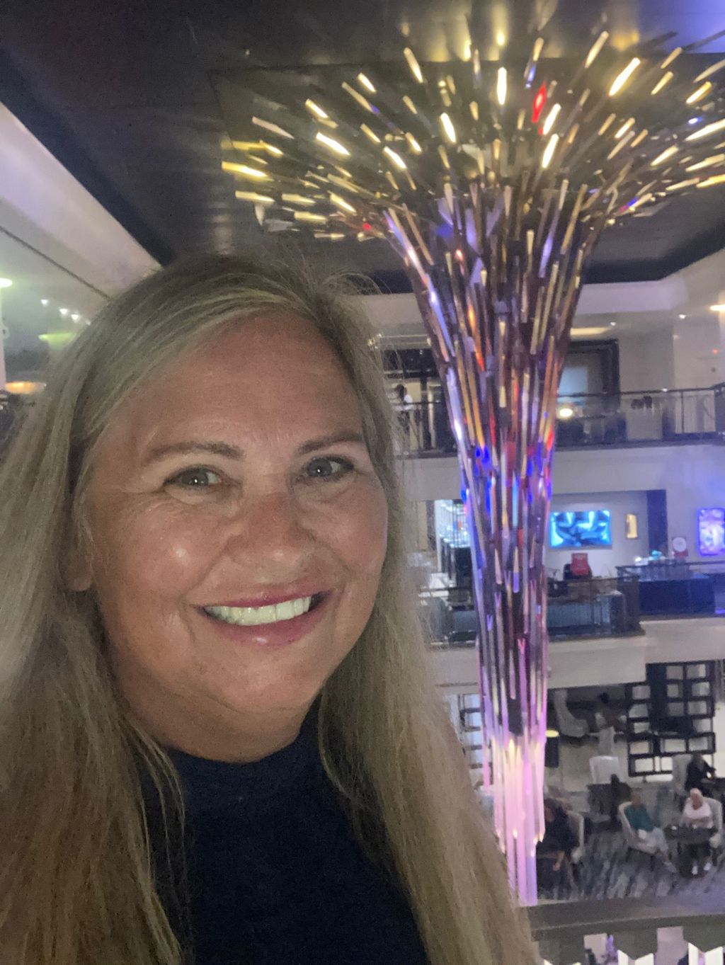 Wendie, a white woman in her 50s, on a cruise ship