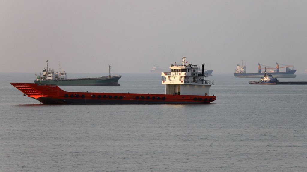 Vessels in the Strait of Hormuz near the beach of Bandar Abbas, Iran, June 21, 2026.