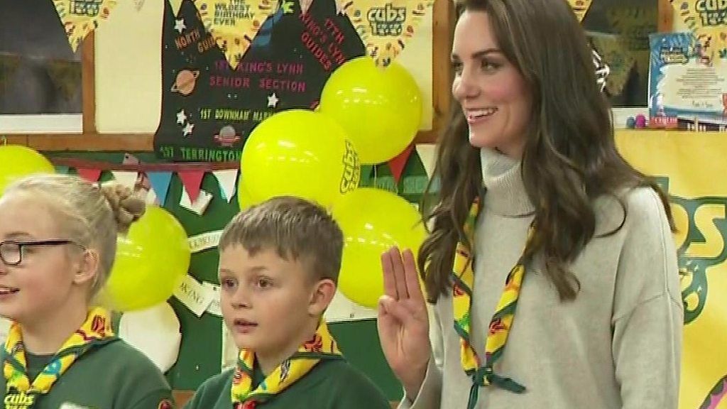 Kate Middleton takes her cub scout promise at a party to celebrate a century of the youth movement.