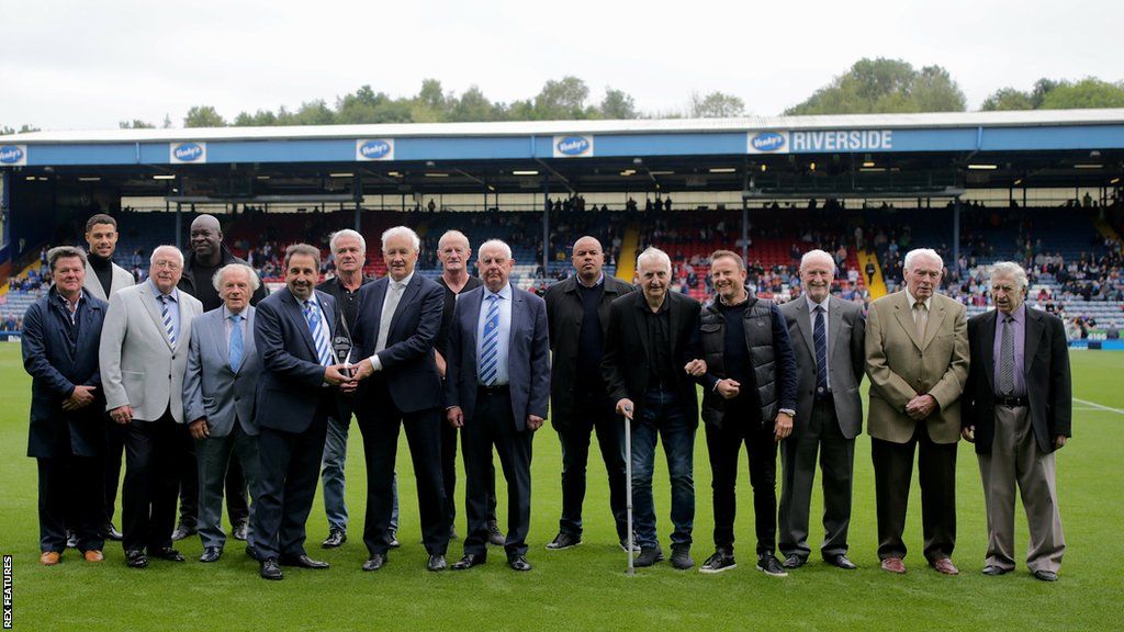 EFL chairman Rick Parry presents a trophy to Blackburn chief executive Steve Waggott and former chairman Rob Coar, watched by club legends, to mark the club's 5,000th league game